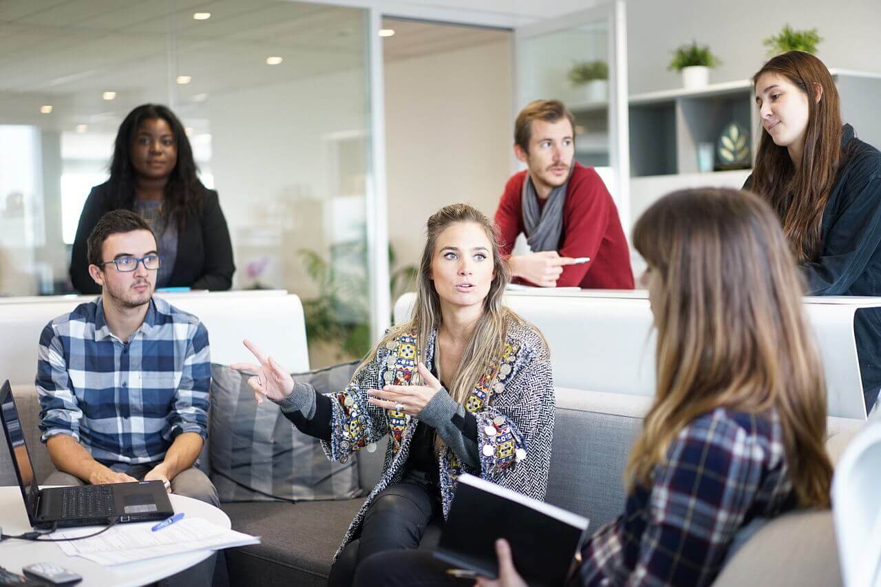 Team of people brainstorming in meeting